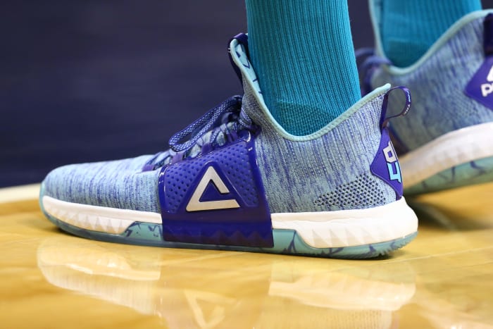 View of blue and green Peak shoes.